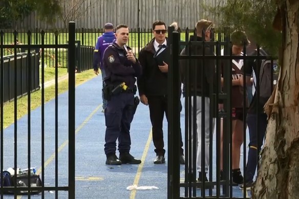 Police at the Old Saleyards Reserve in North Parramatta, where the match was played, on Sunday.