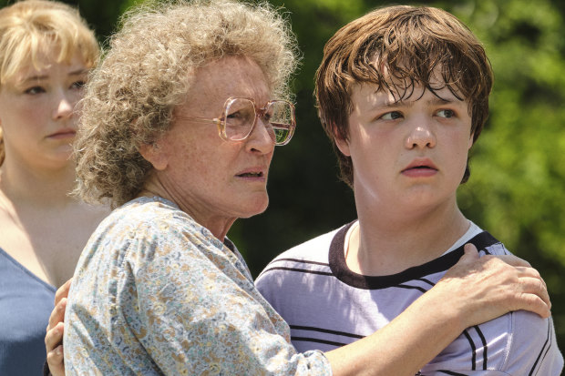 Hillbilly Elegy was turned into a Ron Howard film. Glenn Close, who plays Mamaw, comforts a young Vance, played by Owen Asztalos.