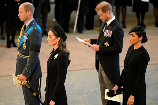 Prince William, Prince of Wales, Catherine, Princess of Wales, Prince Harry, Duke of Sussex, and Meghan, Duchess of Sussex aat the vigil for Queen Elizabeth II in  Westminster Hall