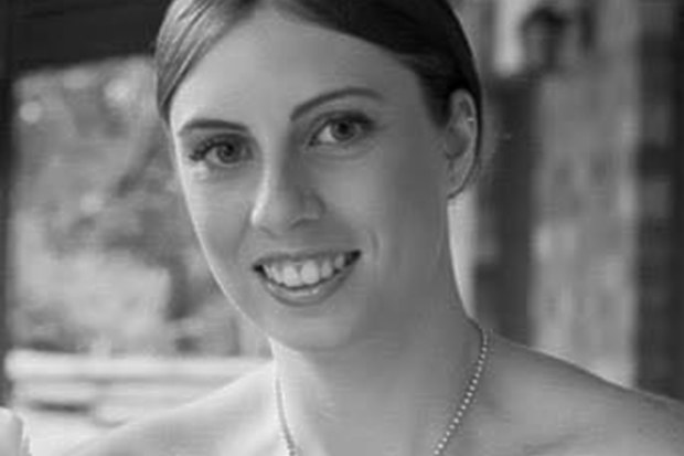 A woman found dead in a Gold Coast backyard with burns to her body has been identified as Kelly Wilkinson.
