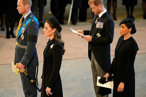 Prince William, Prince of Wales, Catherine, Princess of Wales, Prince Harry, Duke of Sussex, and Meghan, Duchess of Sussex aat the vigil for Queen Elizabeth II in  Westminster Hall