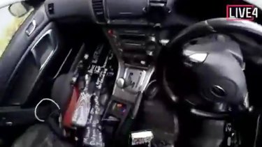This frame from video that was live-streamed  shows guns in the car of a gunman before the mosque shootings in Christchurch, New Zealand. 