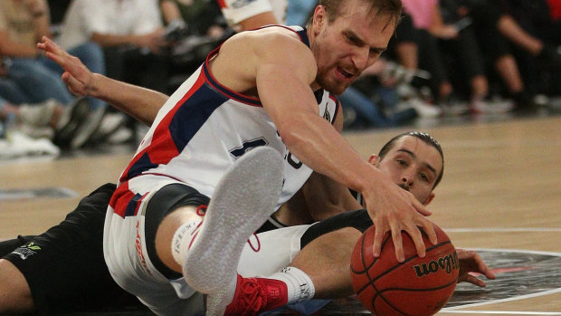 Anthony Drmic tangles with Chris Goulding.