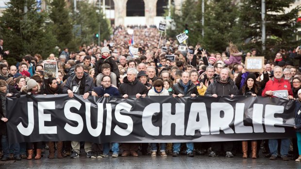 The attack on the satirical magazine spawned the slogan "Je Suis Charlie" (I am Charlie).