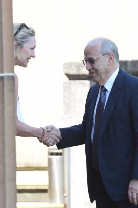 Margaret Cunneen shaking hands with Eddie Obeid outside the NSW Supreme Court in Darlinghurst in February 2016.