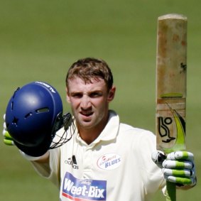 The late Phillip Hughes celebrates scoring a century for NSW in 2009.