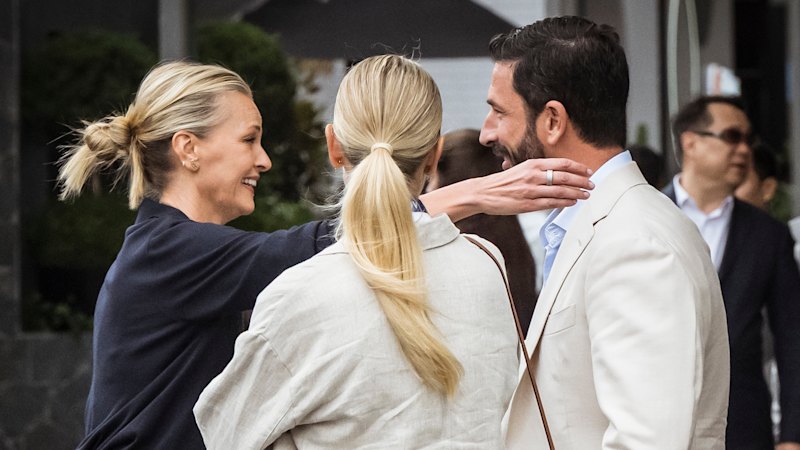 What media rivalry? Sarah Murdoch and Ryan Stokes in friendly embrace at tennis