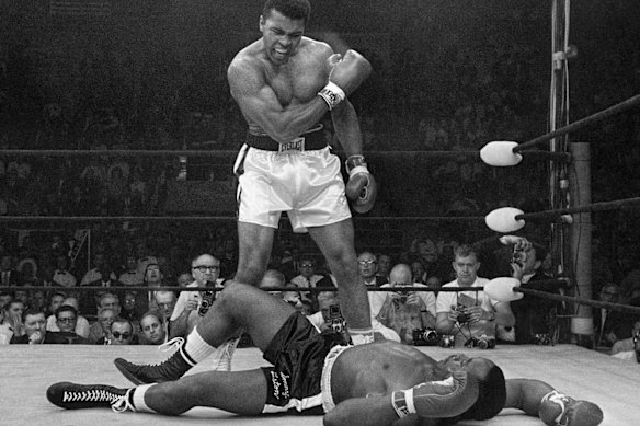 Ali knocks down Sonny Liston in the first round of their second bout on May 25, 1965. 