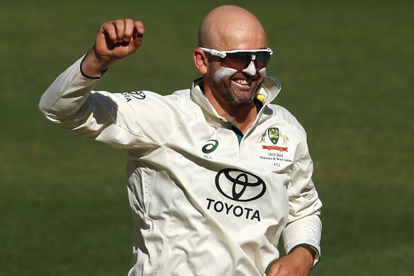 Nathan Lyon celebrates his 500th Test wicket on Sunday.