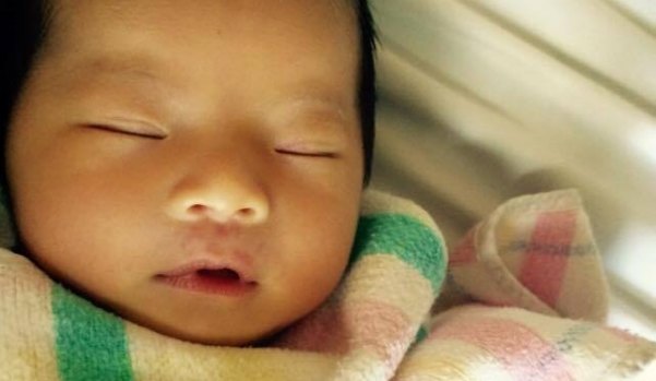 Two-month-old Queenie Xu was stabbed to death at her home in Brisbane's south.