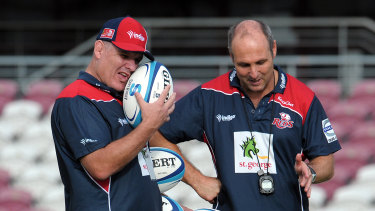 Queensland Reds' attack coach Jim McKay (right) with then head coach coach Ewen McKenzie during training in Brisbane before the 2012 Super Rugby campaign.