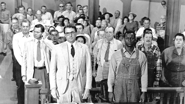  Gregory Peck, foreground left, and Brock Peters, foreground right, in a scene from the 1962 film <i>To Kill a Mockingbird</i>.