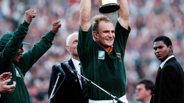 Springboks captain Francois Pienaar lifts the William Webb Ellis trophy at Ellis Park after the 1995 World Cup final. 