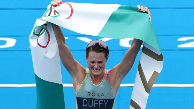 Solid gold: Triathlete Flora Duffy celebrates becoming Bermuda’s first ever Olympic champion.
