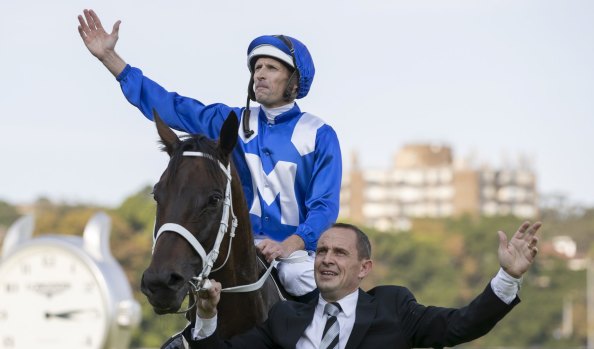 Final bow: Hugh Bowman and Chris Waller with Winx after the Queen Elizabeth Stakes.