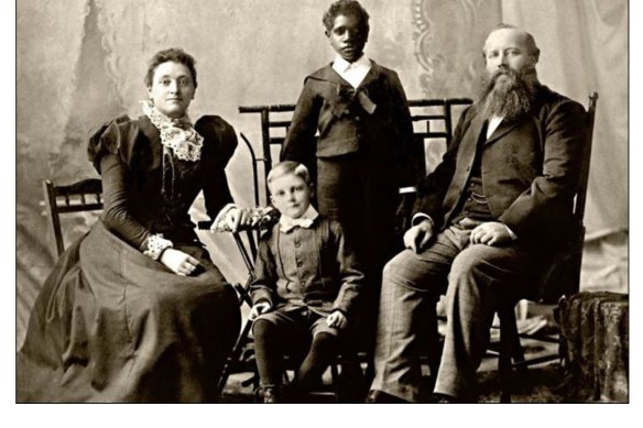 Douglas Grant, centre rear, with the Grant family who adopted him.