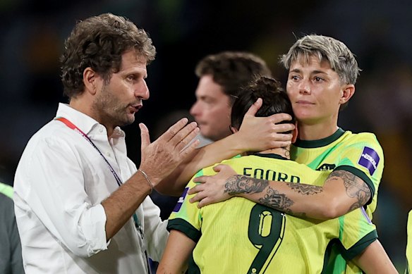 Joe Montemurro and Michelle Heyman console Caitlin Foord after full-time in Saturday night’s final.