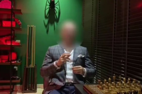 Screengrab from a leaked video of Joule Sullivan teaching the “penetrating the elite” course to Tate’s top-tier subscribers. His face is blurred in the original video.
