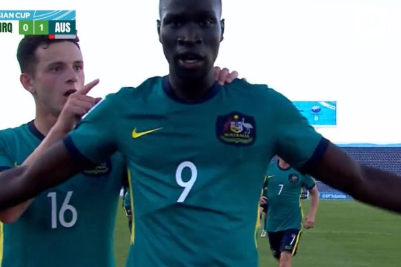 Alou Kuol celebrates his scorpion kick goal for the Olyroos in the Asian Cup.