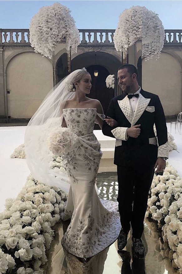 The happy couple on their golden catwalk in Florence last weekend, Jaimee Belle Gardner and James Kennedy.