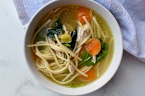 This comforting chicken noodle soup starts with a whole chook.
