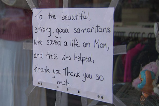 A sign outside the front of the business thanked the men for their actions.