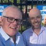 Former Prime Minister Scott Morrison with Liberal candidate Simon Kennedy at a polling booth on Saturday.