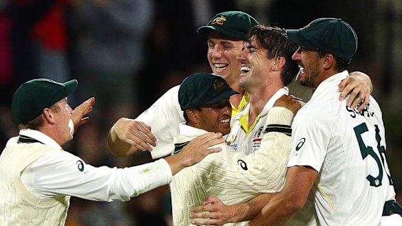 The Australians celebrate after completing a 4-0 series win in Hobart.