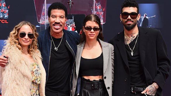 Lionel Richie with his children, Nicole, Sofia and Miles in March.