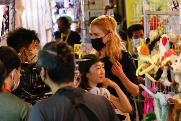 Australian actor Nicole Kidman acts during the filming of a scene for the Amazon Prime series “Expats” in Hong Kong on Monday. She was spotted at a COS shop last week.