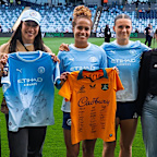 Mary Fowler and Kerstin Casparij with Wallaroos players.