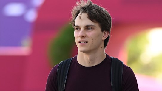Oscar Piastri arrives in the paddock in Qatar. 