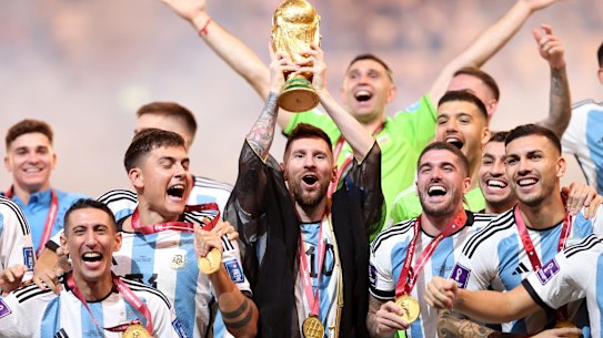 Lionel Messi lifts the FIFA World Cup Qatar 2022 Trophy.