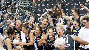 The Canberra Capitals celebrate their grand final win last month in the WNBL.