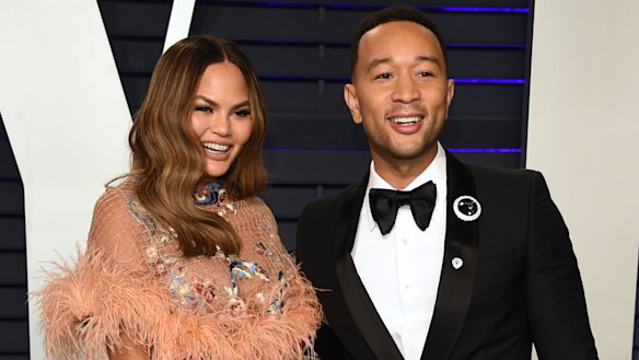 Chrissy Teigen and John Legend at the Vanity Fair Oscar Party.