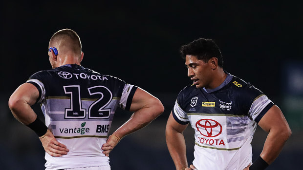 The Cowboys' Jason Taumalolo and Coen Hess after defeat against the Wests Tigers last weekend - the team's third straight loss.