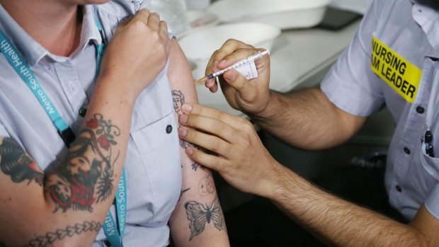 The Queensland government has defended its vaccination program after confirming a doctor working in a COVID-19 ward at Princess Alexandra Hospital has not been inoculated.
