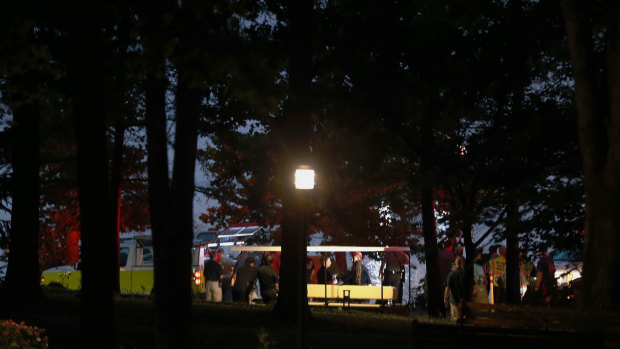 Emergency workers at the scene of a capsized tourist boat in Missouri.