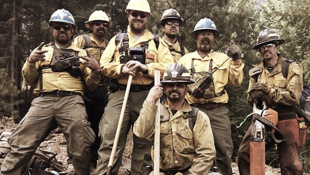 RFS firefighter Daniel Barwick, third from left, with colleagues in Washington state.
