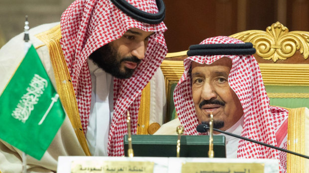 Saudi Crown Prince Mohammed bin Salman, left, speaks to his father, King Salman, right, at a meeting in Riyadh.