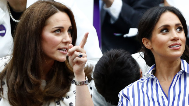 The Duchess of Cambridge and Meghan, Duchess of Sussex, watch the women's singles final at Wimbledon.