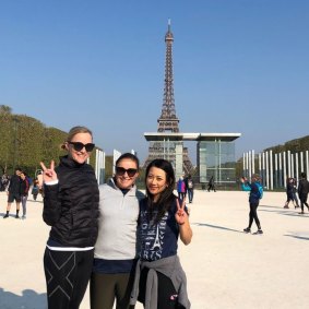 Alice Whyte, Mary Dullard and Lan Leung near the Eiffel Tower on Sunday.