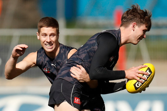 Paddy Dow is tackled by Lachie Fogarty at training earlier this month.