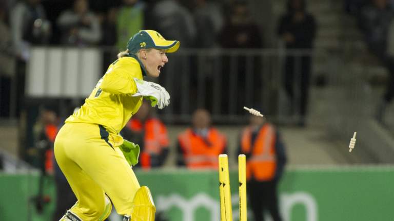 Friendly fire: Alyssa Healy suffered a head knock in a collision with teammate Megan Schutt.