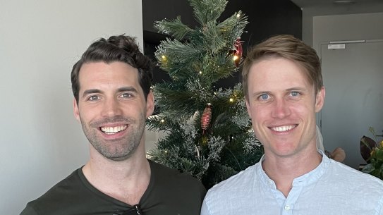 James Bolster (right) and his partner, Zann, lived in a two-bedroom apartment with their COVID-positive flatmate but avoided infection. 