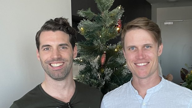 James Bolster (right) and his partner, Zann, lived in a two-bedroom apartment with their COVID-positive flatmate but avoided infection. 