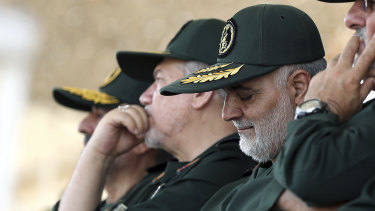 Iranian supreme leader, General Qassem Soleimani, centre, who heads the elite Quds Force of Iran's Revolutionary Guard.