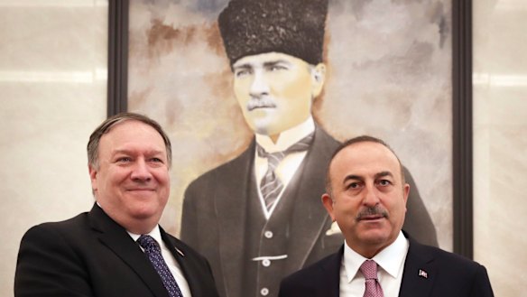 Turkey's Foreign Minister Mevlut Cavusoglu, right, and US Secretary of State Mike Pompeo meet in Ankara, Turkey.