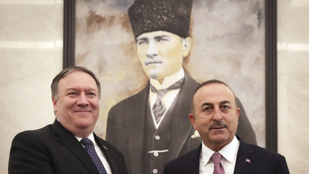 Turkey's Foreign Minister Mevlut Cavusoglu, right, and US Secretary of State Mike Pompeo meet in Ankara, Turkey.