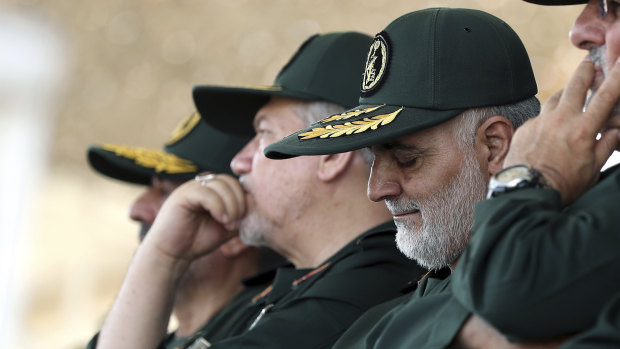 Iranian supreme leader, General Qassem Soleimani, centre, who heads the elite Quds Force of Iran's Revolutionary Guard.